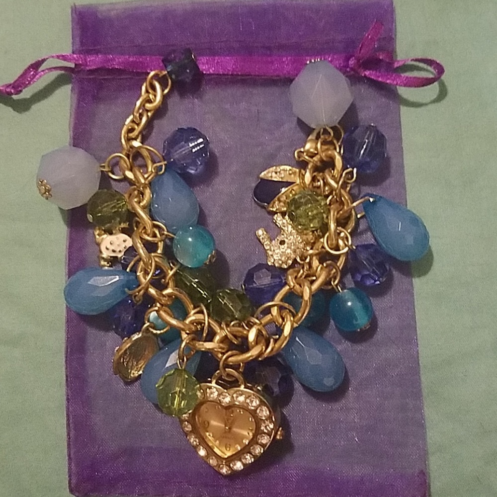Blue bracelet with dangling animal charms